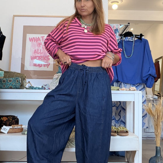 Calças Baggy Dark Jeans da Paprika, perna larga afunilada em baixo