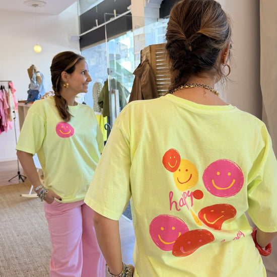 T-shirt amarelo-lima com estampado de smiles nas costas